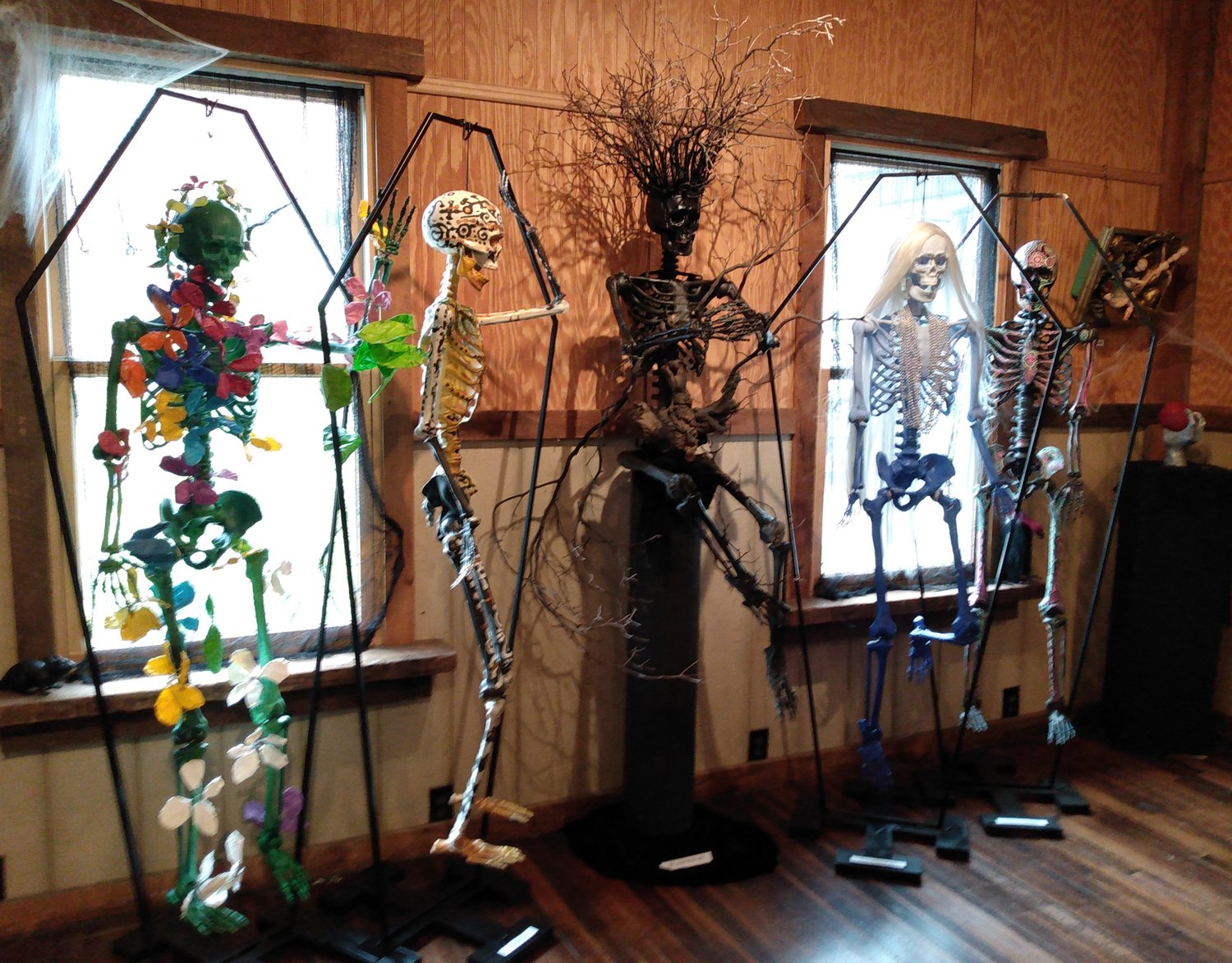 These skeletons being auctioned off are now hanging “Outa da Closet” as part of the Wayne County Arts Alliance’s “Haunted Mezzanine” exhibit.
